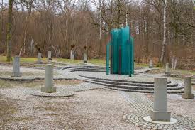 Débouchage Viroinval scène urbaine avec église Saint-Lambert et maison traditionnelles en arrière-plan